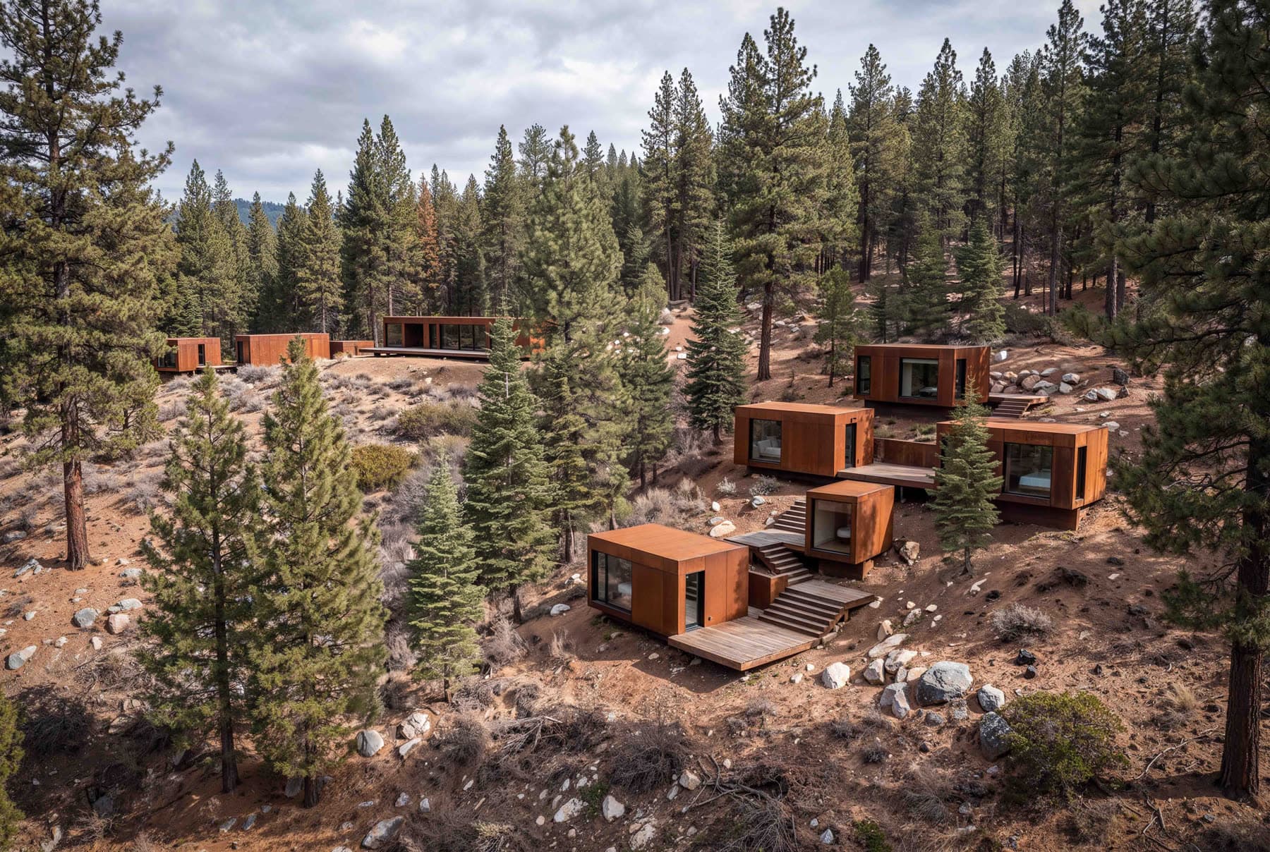 Corten cabins set among the pines on the Foresthill ridge