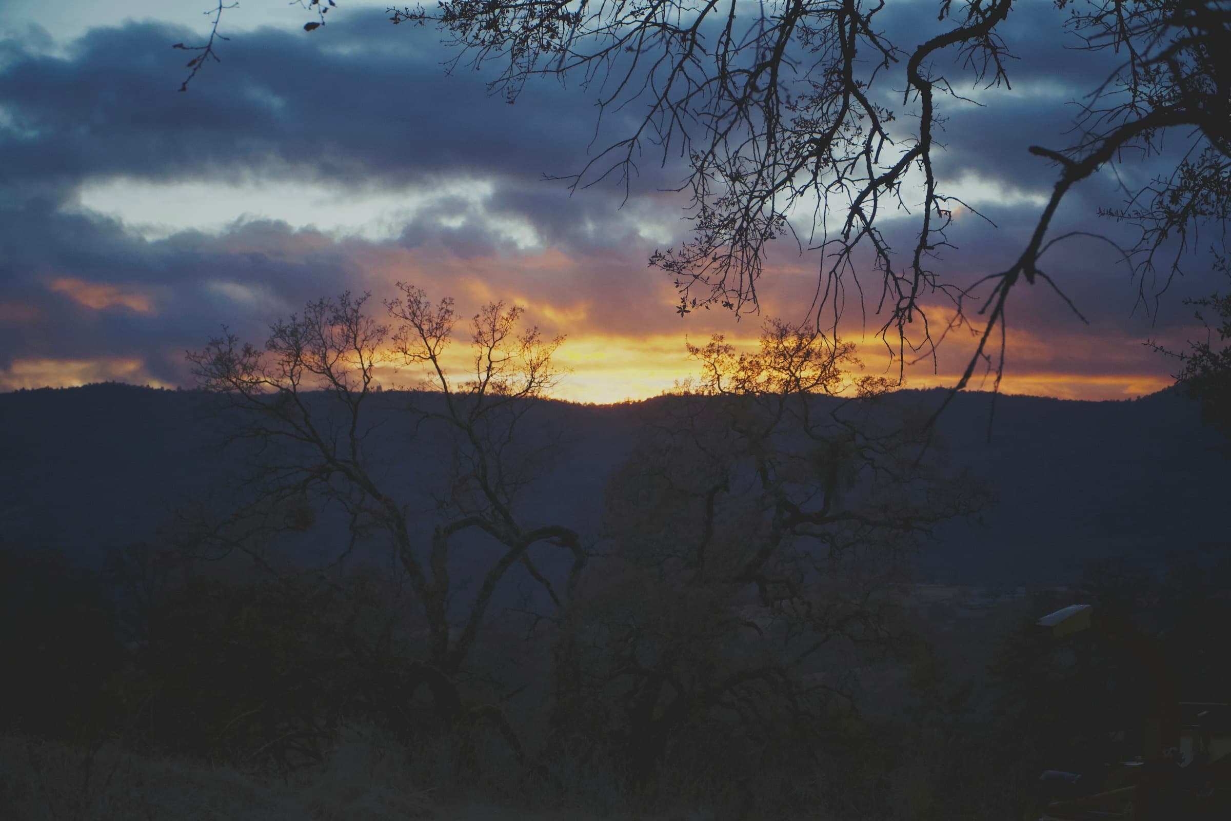 Golden hour over the forested ridges around Foresthill